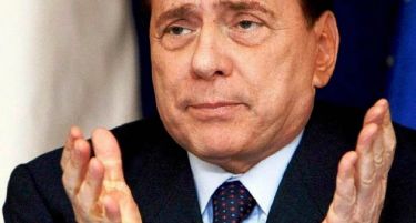 Берлускони осуден на три години затвор за корупција